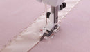 Pied pour surpiqûre près du bord transparent